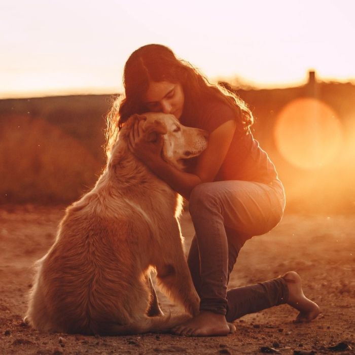 woman-hugging-dog